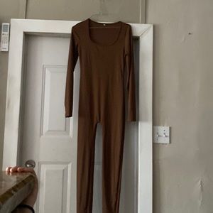 NEVER worn Brand new, brown body suite, Size small, Stretchy